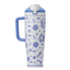 Heirloom 40oz Tumbler with handle; white body with blue delft-style illustrated pattern of stars, flowers, and charms; periwinkle blue handle and lid