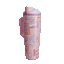 FreeSip Tumbler 40oz Sending Love; rotating view of blush pink handled tumbler with pastel illustrated stamp patches and pink flip cap