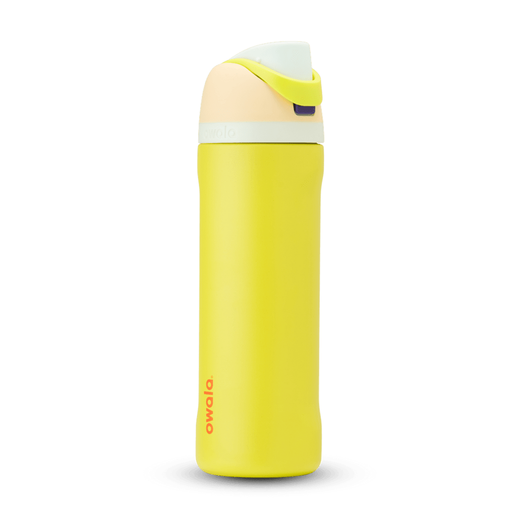 FreeSip 24oz in Lemon Limeade, bright yellow body with peach lid, neon yellow-green carry loop, white accent band, and orange logo