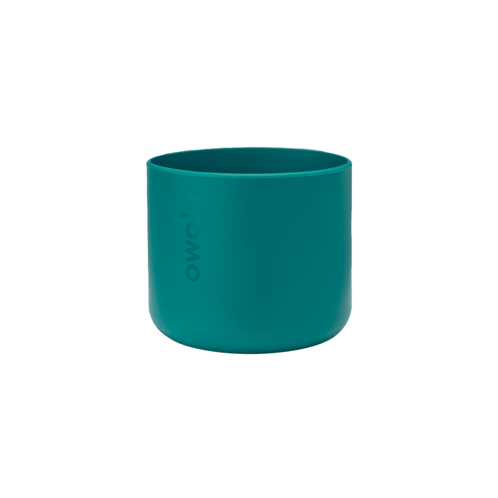 Bottle Boot 24oz in teal green silicone; small cylindrical form with Owala wordmark