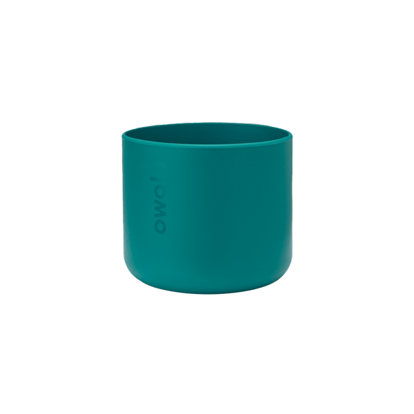 Bottle Boot 24oz in teal green silicone; small cylindrical form with Owala wordmark