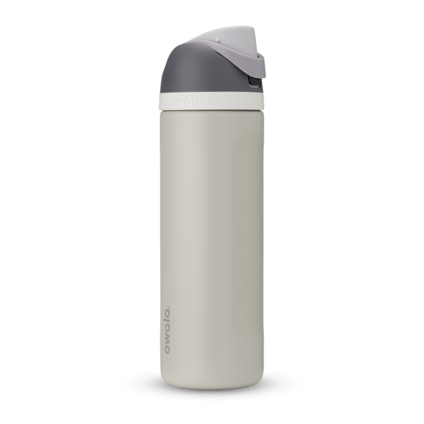FreeSip 24oz in Rock On, cream stone body with dark grey flip cap, light grey carry loop, and white accent band