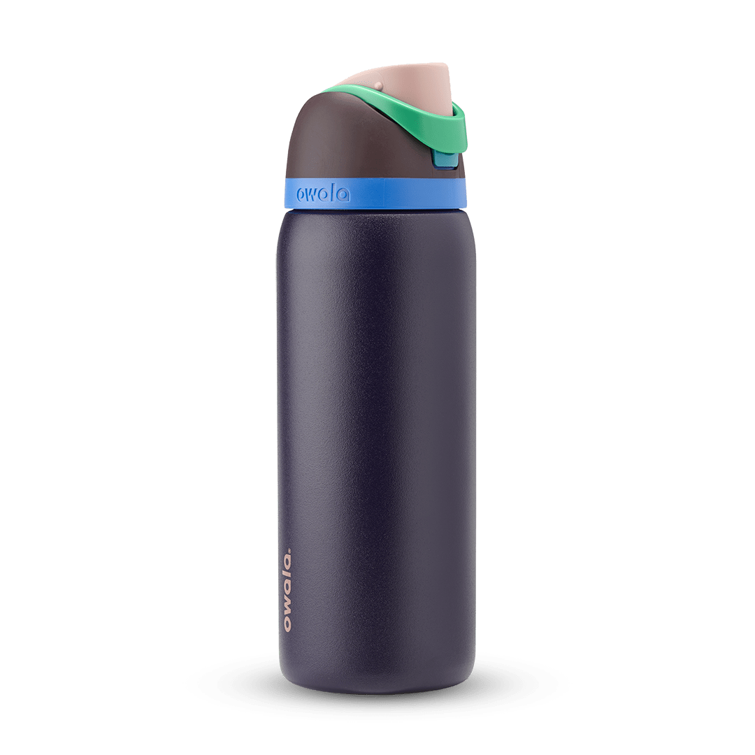FreeSip 32oz in Night Safari, dark navy body with bright blue accent band, green spout tab, and tan carry loop