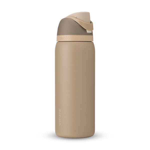FreeSip 32oz in Down to Earth, warm sand/tan body with matching tan flip cap and carry loop