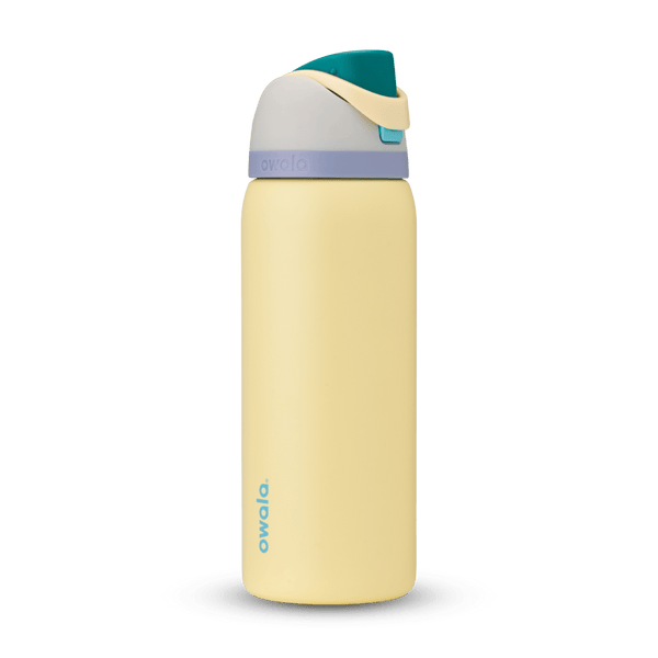 FreeSip 32oz in Sunny Daze, soft yellow body with teal flip cap, cream carry loop, gray lid, and lavender accent band