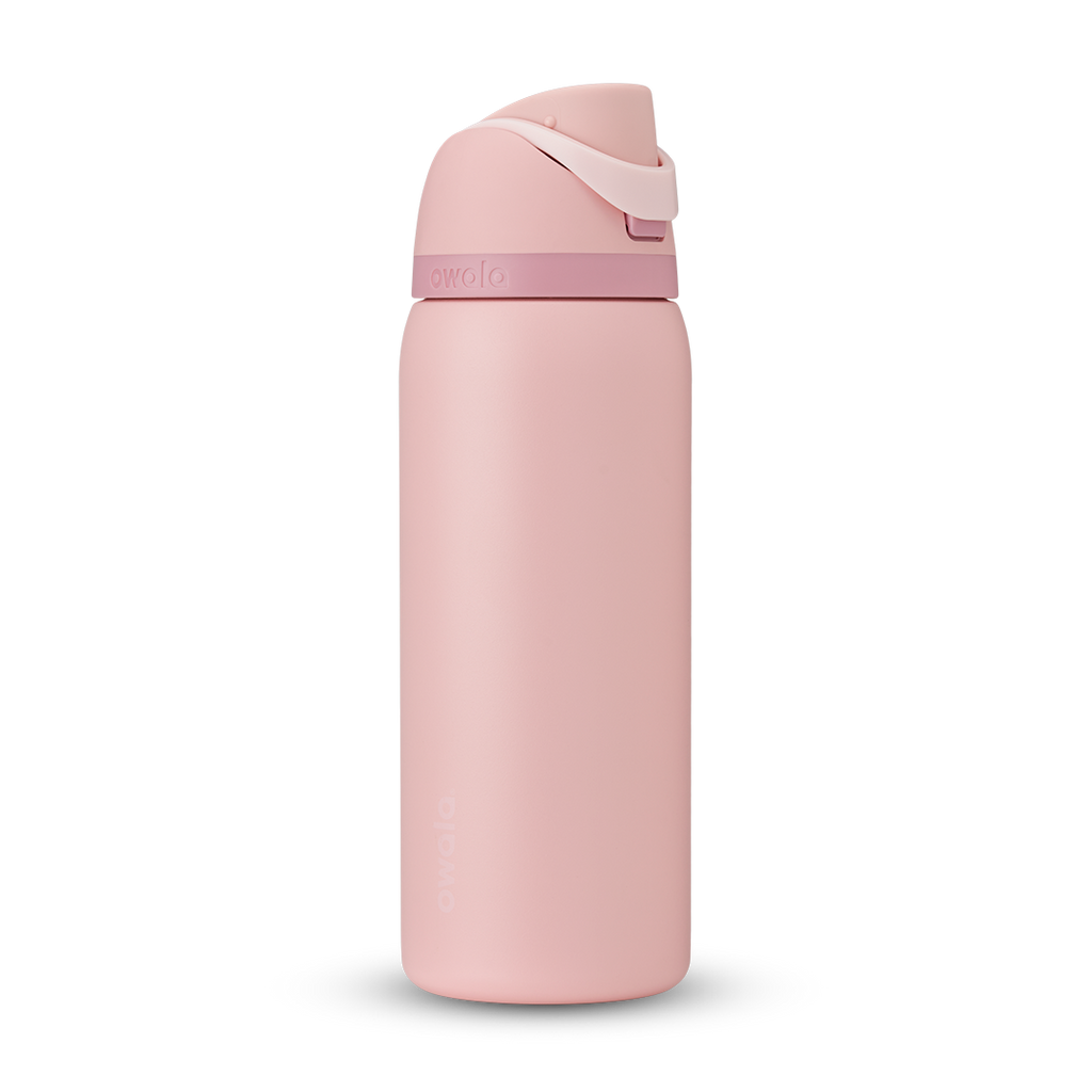 FreeSip 32oz in Rose Quartz, soft pink body with matching pink flip cap, light pink carry loop, and dusty mauve accent band