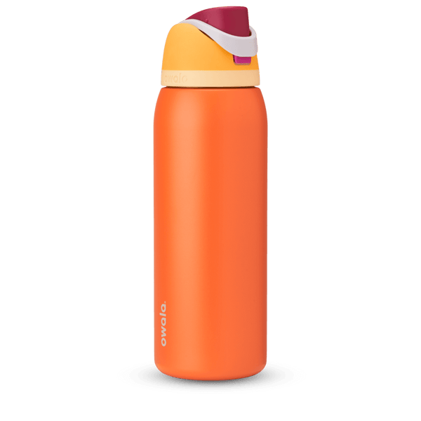 FreeSip 40oz in Citrus Crush, bright orange body with yellow flip cap, magenta carry loop, and cream accent band