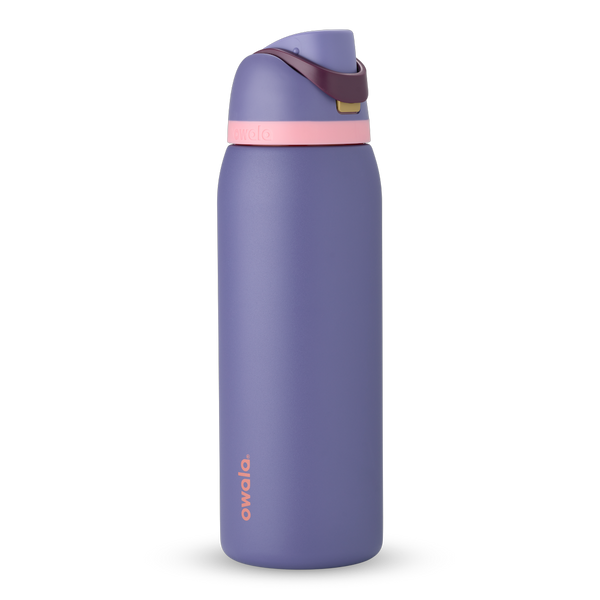 FreeSip 40oz in Blue Jay, dusty purple body with matching purple flip cap, dark burgundy carry loop, and light pink accent band