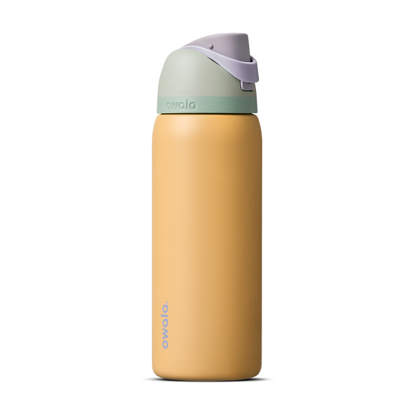 FreeSip 32oz in Beachfront, warm golden yellow insulated bottle with mint green accent band, lavender flip cap, and lavender carry loop