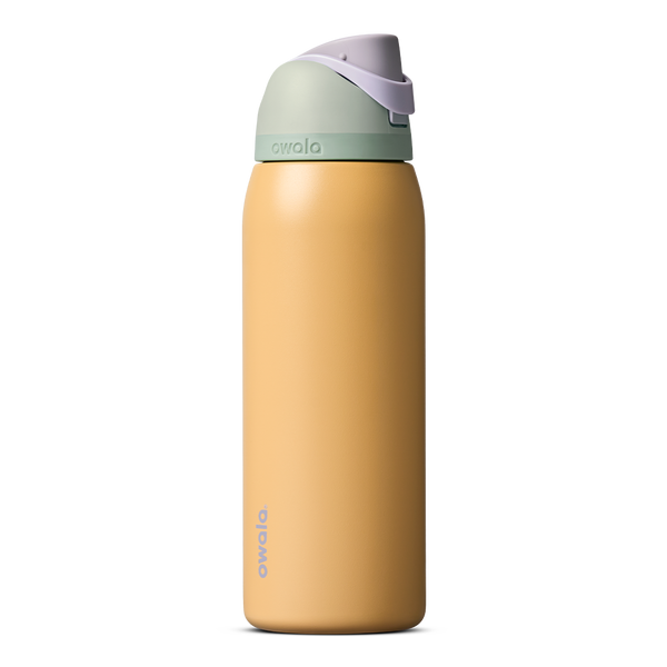 FreeSip 40oz in Beachfront, warm golden yellow insulated bottle with mint green accent band, lavender flip cap, and lavender carry loop
