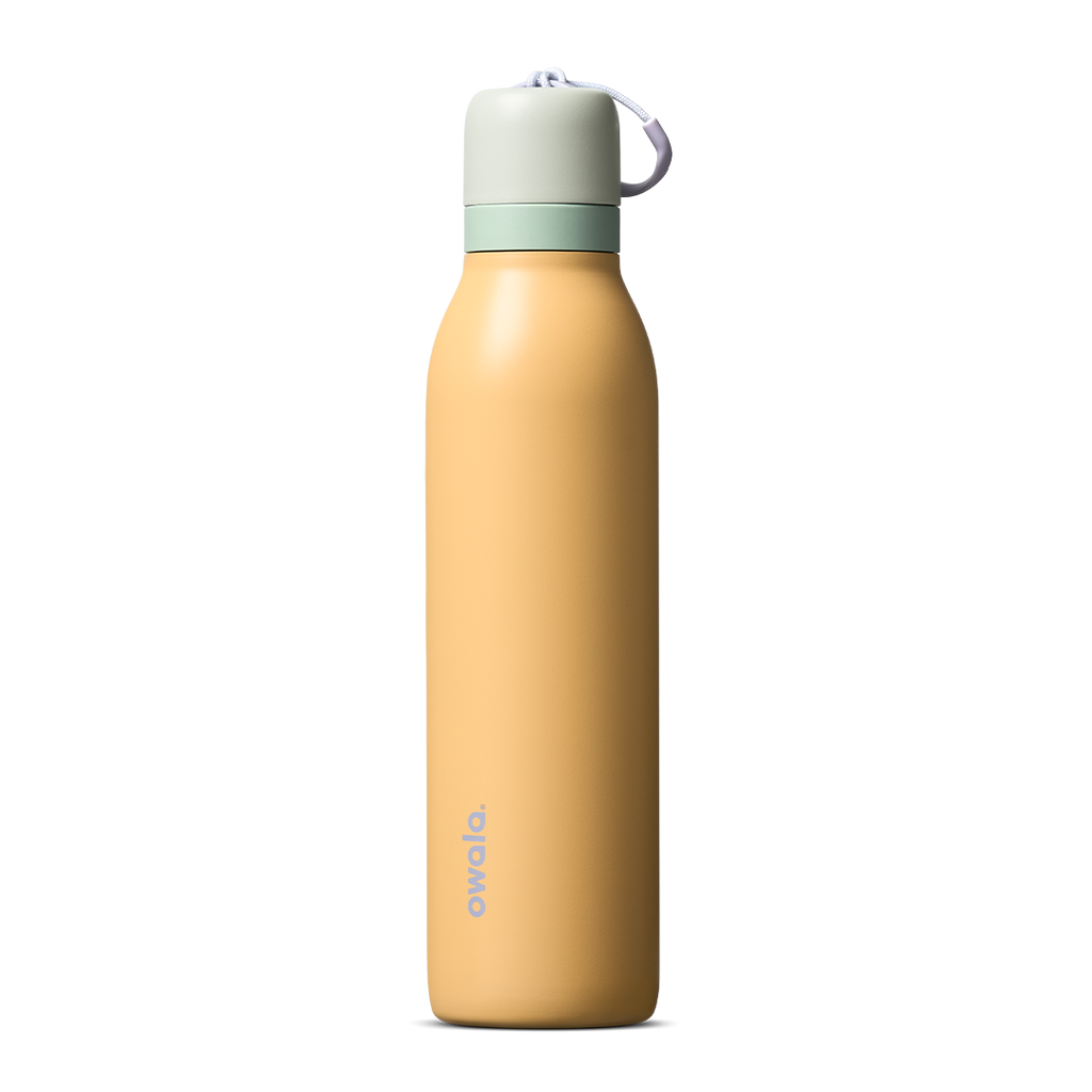 FreeSip Twist 24oz in Beachfront (muted golden yellow) with a pale mint green lid and white loop, shown