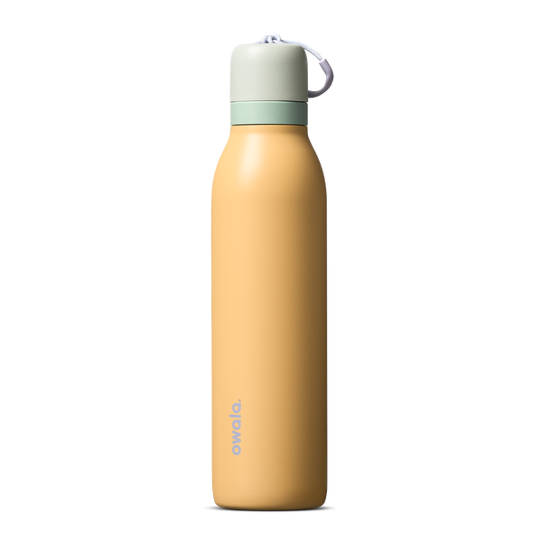 FreeSip Twist 24oz in Beachfront (muted golden yellow) with a pale mint green lid and white loop, shown