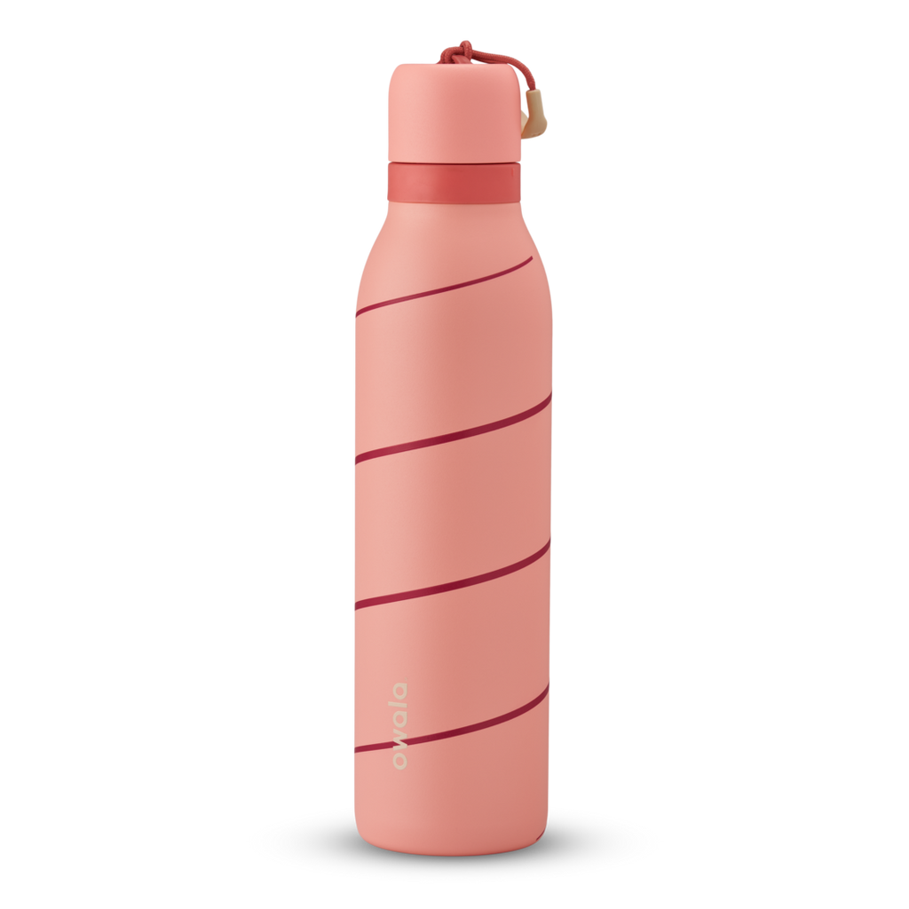 FreeSip Twist 24oz in Candy Cane Lane, coral pink insulated water bottle with diagonal dark red candy-cane stripe pattern, matching pink twist cap, and red carry loop