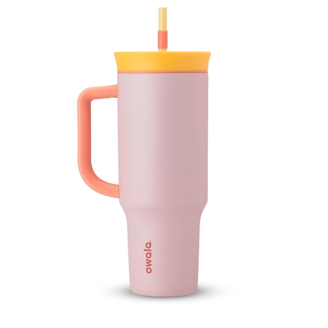 40oz Tumbler in Candy Store, soft blush pink insulated tumbler with coral handle, golden yellow lid, and straw Main image