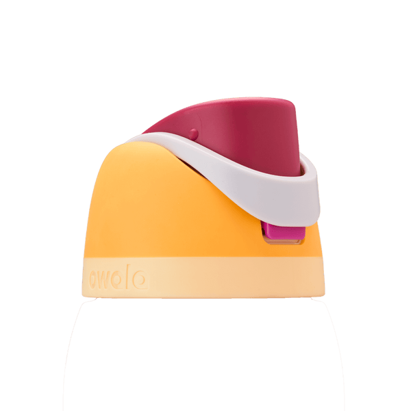 Owala FreeSip replacement lid in Citrus Crush, golden orange body with magenta pink flip cap, white carry loop, and pale yellow base accent band