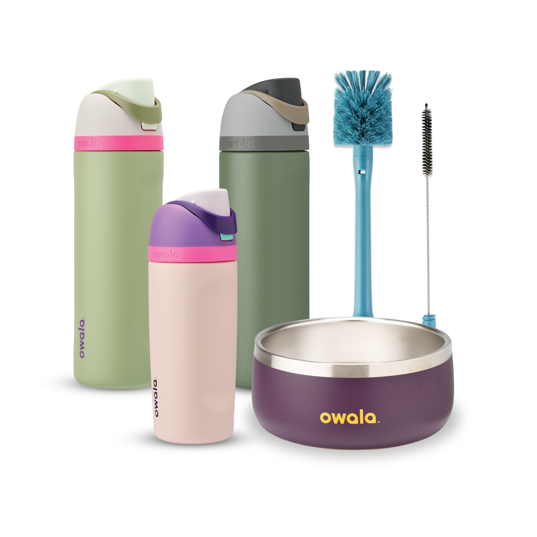 Family Bundle with accessories; two tall FreeSip water bottles in green and pink-mauve, a Kids Tumbler in pink-mauve with teal lid, a purple Pet Bowl with stainless rim, and a blue bottle brush Main image