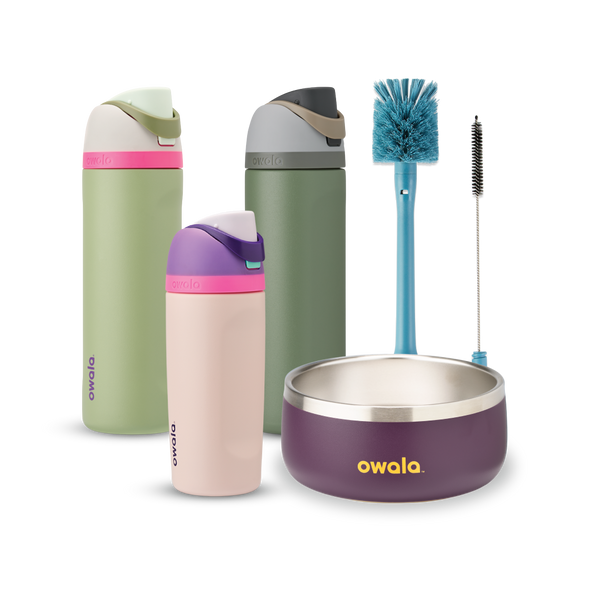 Family Bundle with accessories; two tall FreeSip water bottles in green and pink-mauve, a Kids Tumbler in pink-mauve with teal lid, a purple Pet Bowl with stainless rim, and a blue bottle brush