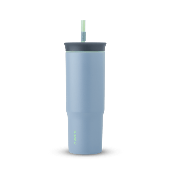 24oz Tumbler in Lost Valley; matte denim-blue insulated tumbler with dark slate-gray lid, mint green accent ring, and matching mint green straw, Owala wordmark on front