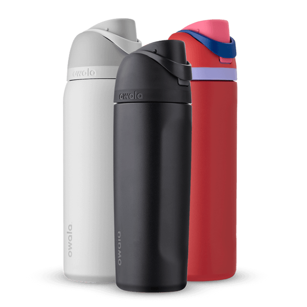 FreeSip Bundle; group of three FreeSip insulated water bottles in white, black, and red with lavender carry loop and navy accent band