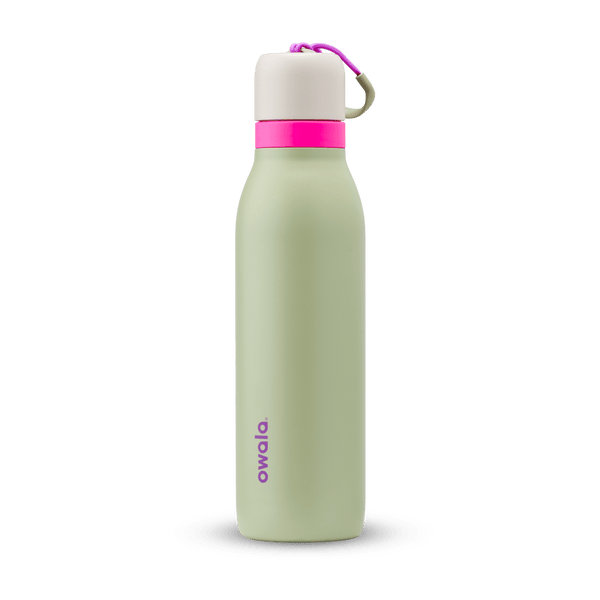 FreeSip Twist 18oz in Neo Sage, sage green insulated water bottle with cream twist cap, hot pink twist cap accent band, magenta carry string, and purple Owala logo