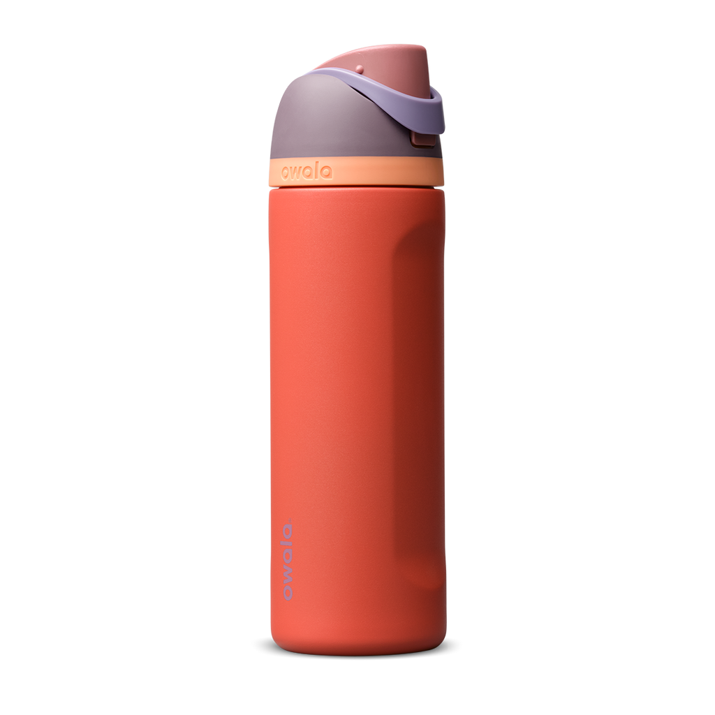 FreeSip 24oz in Terracotta Sunset, warm terracotta orange insulated bottle with muted mauve purple flip cap and peach accent band