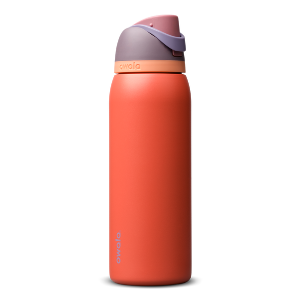 FreeSip 40oz in Terracotta Sunset, warm terracotta orange insulated bottle with muted mauve purple flip cap and peach accent band