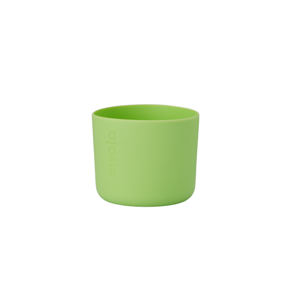 Owala Bottle Boot in bright lime green silicone with tonal Owala logo, short cylindrical form sized for 16oz Kids' FreeSip bottles