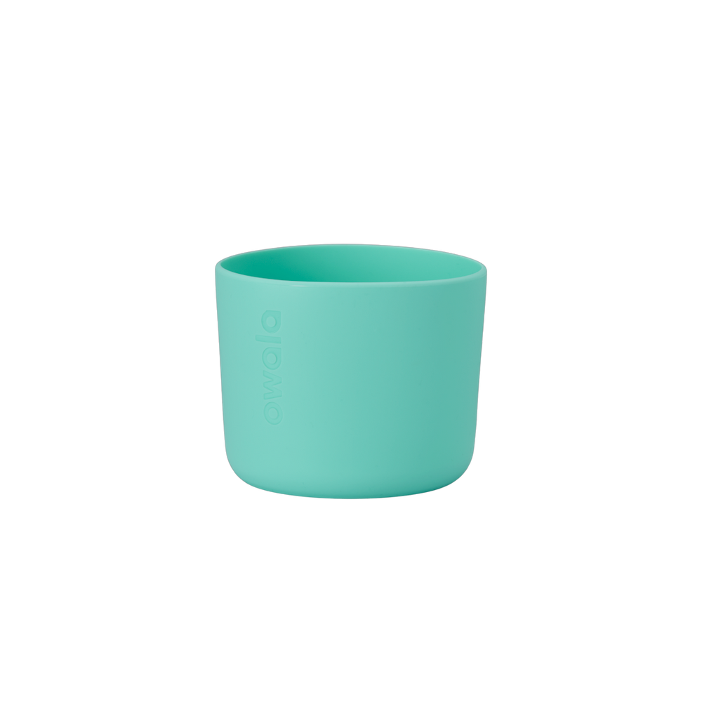 Owala Bottle Boot in bright mint teal silicone with tonal Owala logo, short cylindrical form sized for 16oz Kids' FreeSip bottles