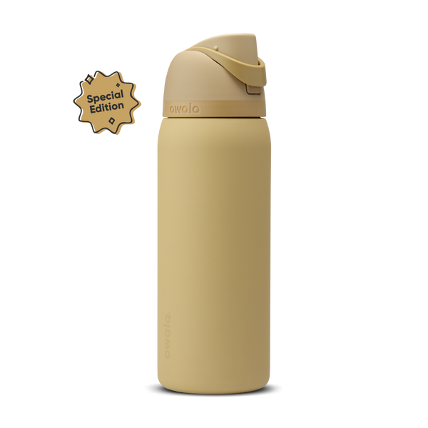 FreeSip 32oz Autumn Vista; warm golden sand body with matching tan flip cap, lighter cream-tan carry loop, and tan lid