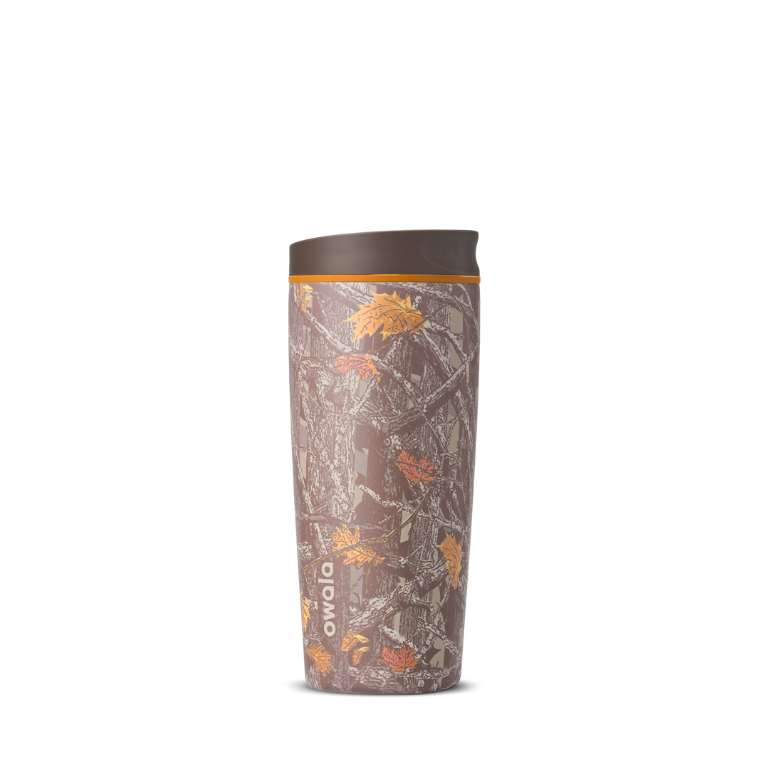 SmoothSip Slider 20oz in Out of Sight, brown forest Mossy Oak camouflage print with leaves and branches across the body, brown lid, and orange accent ring Main image