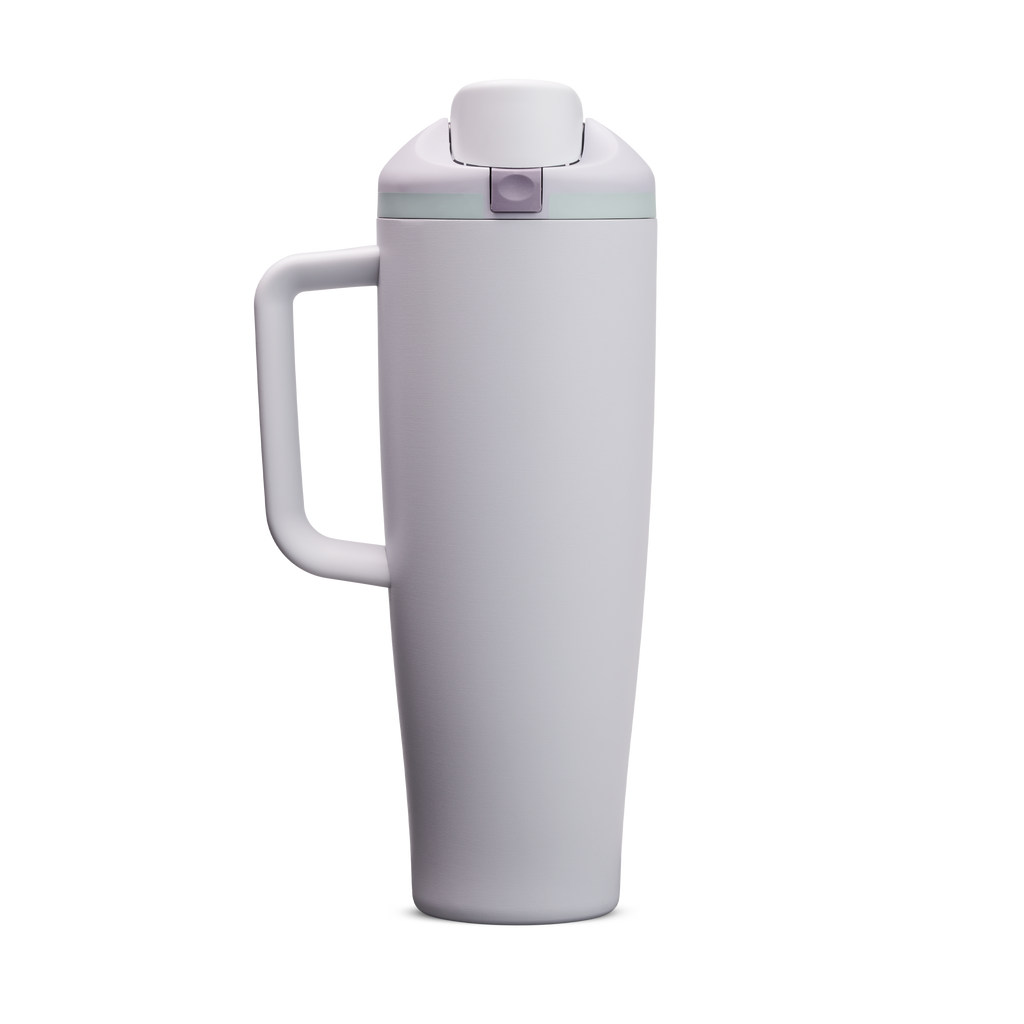 FreeSip Tumbler 40oz Open Air, pale lavender/light purple body with matching lavender flip cap, light blue accent band, and lavender handle