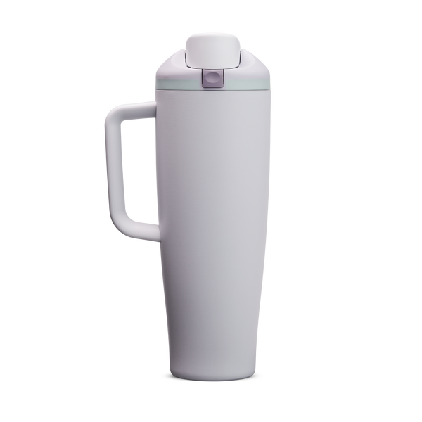 FreeSip Tumbler 40oz Open Air, pale lavender/light purple body with matching lavender flip cap, light blue accent band, and lavender handle