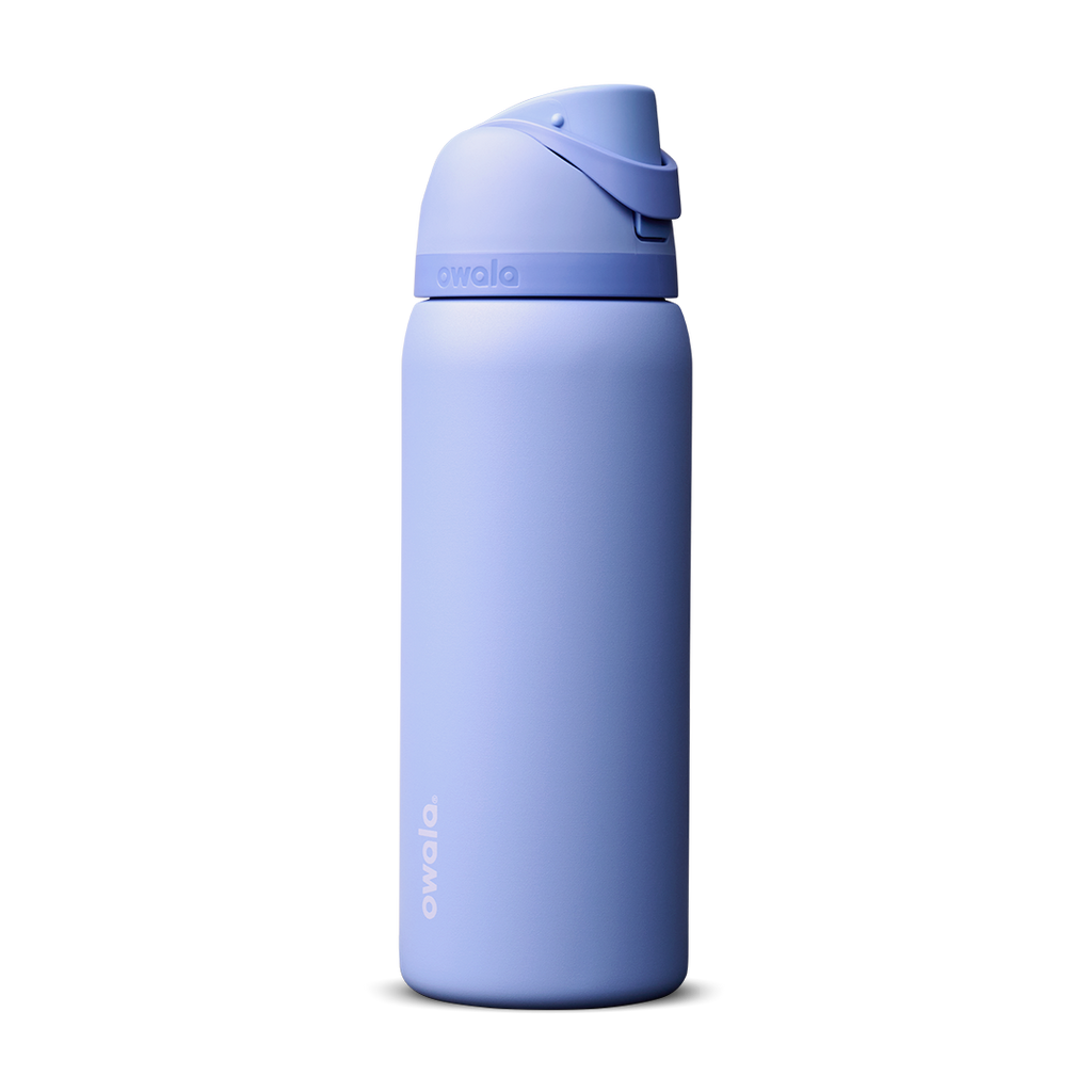Owala FreeSip 32oz in Out of the Blue, periwinkle blue insulated bottle with matching blue-lavender flip cap and carry loop