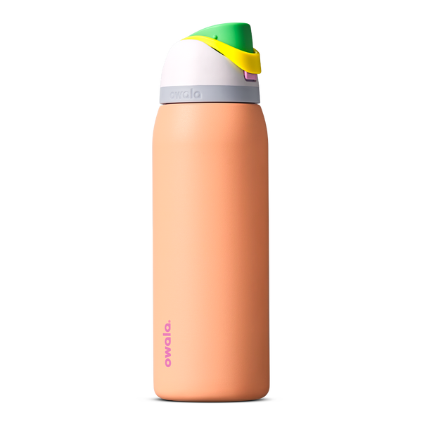 FreeSip 40oz in Peachy Keen, soft peach orange insulated bottle with white flip cap lid, yellow flip tab, and bright green carry loop