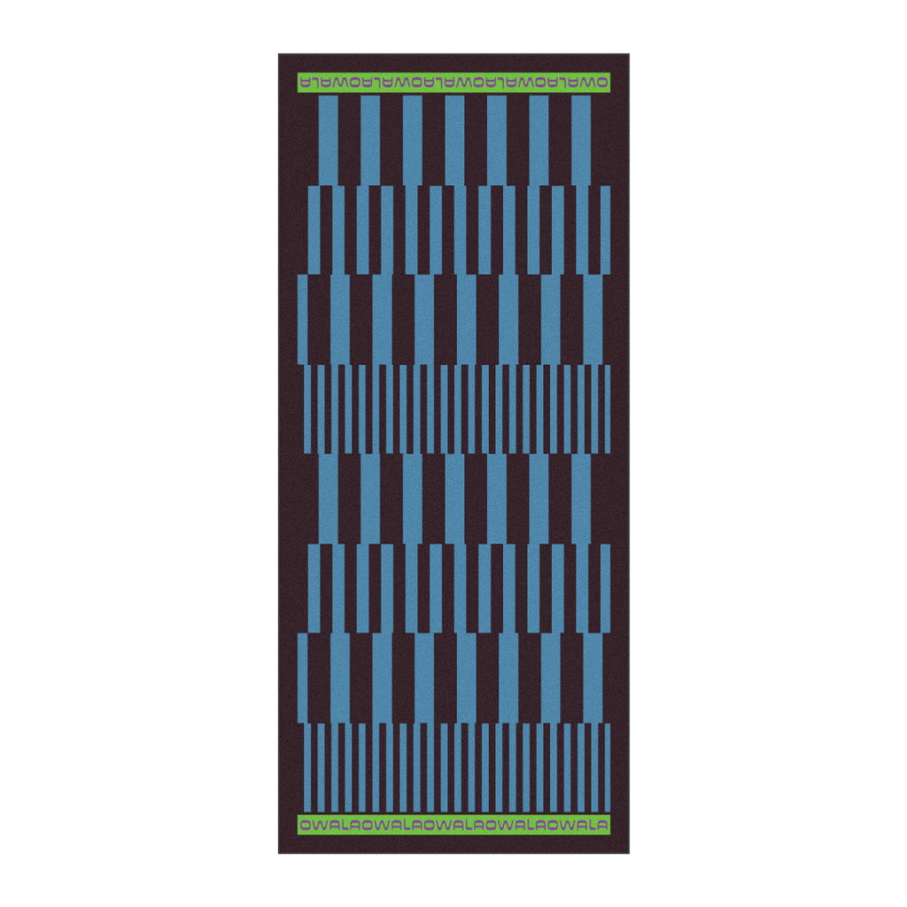 Owala Beach Towel in Retro Dive; geometric pattern of bright blue rectangular blocks on a dark brown background with green Owala logo borders at top and bottom