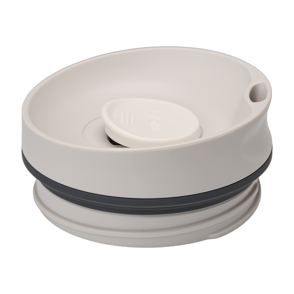 SmoothSip Slider replacement lid in Shy Marshmallow, flat round off-white/cream disc lid with recessed slider button and dark gray sealing ring