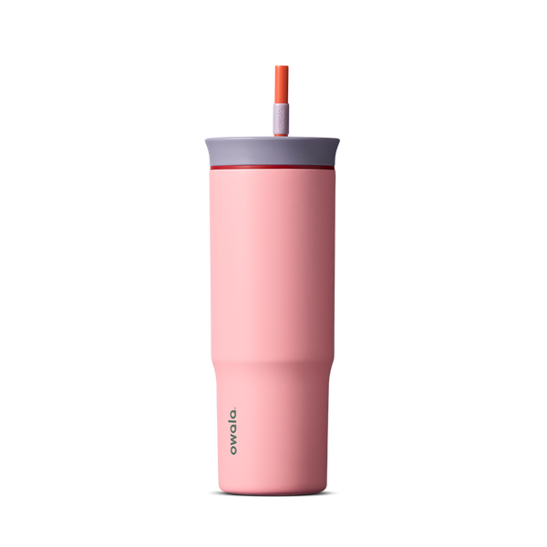 24oz Tumbler in Sugar High; matte coral-pink insulated tumbler with lavender-gray lid and orange-red straw, Owala wordmark on front