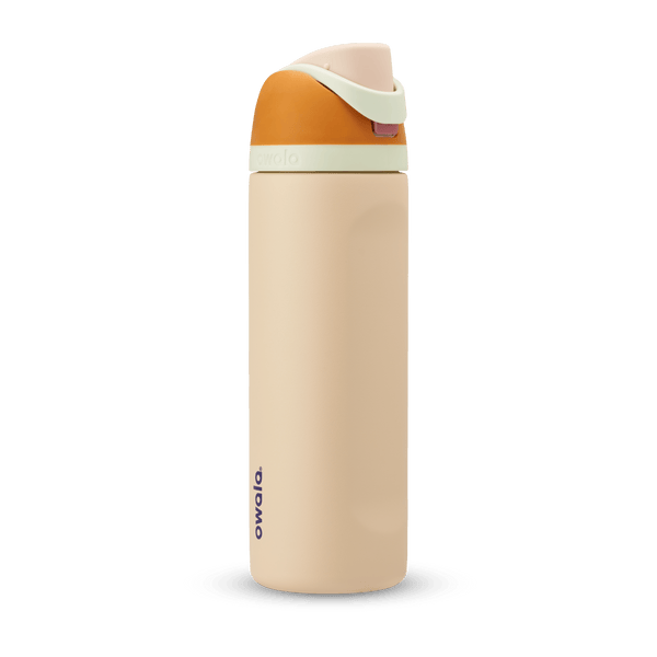 FreeSip 24oz in Water in the Desert, sand tan body with orange flip cap, mint green carry loop, and tan lid