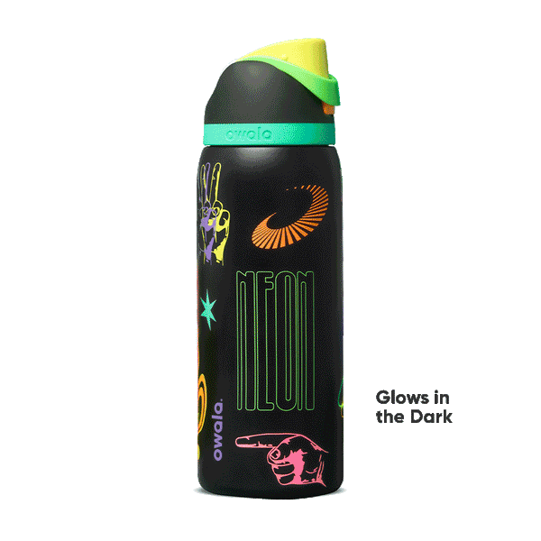 FreeSip 32oz in All Systems Glow, matte black body with neon graphic patches and mint green flip cap; glows in the dark