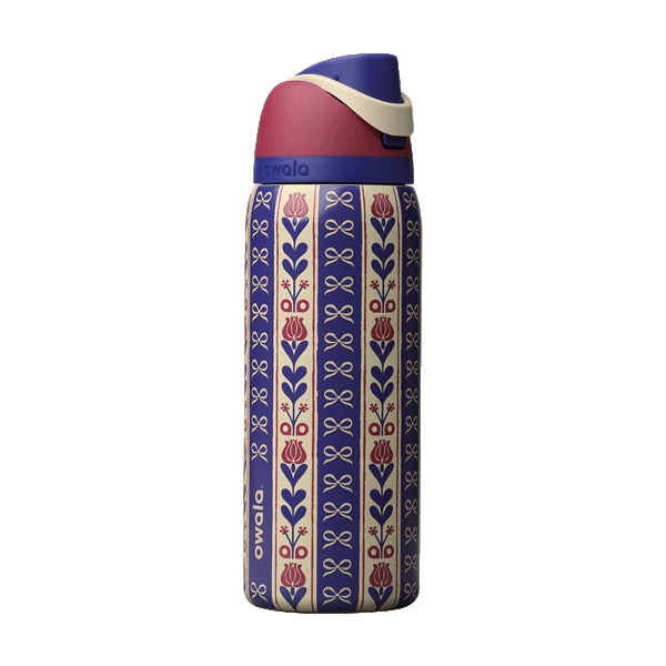 FreeSip 32oz Holiday Hygge; rotating view of cream and navy blue striped body with vertical floral motifs of red tulips and navy bows in a folk-art pattern, dusty rose flip cap, cream carry loop, and navy blue lid