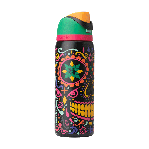 Rotating view of FreeSip in Sugar Skull, black body with colorful Day of the Dead sugar skull graphic in pink, yellow, green, and orange; green flip cap with orange detail and hot pink accent band on the lid; glows in the dark